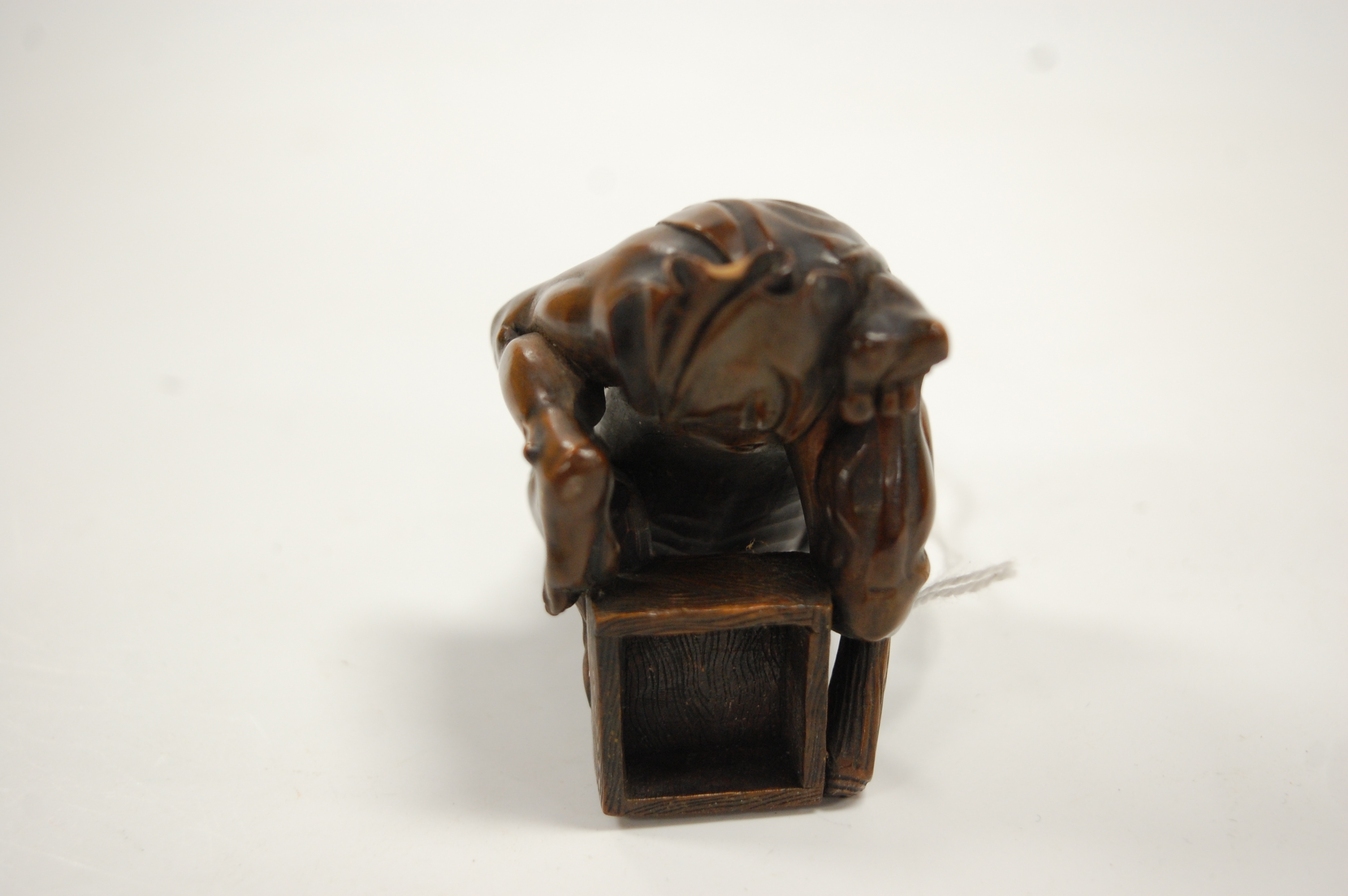 A Japanese Meiji period softwood netsuke, carved as a man in kneeling pose with rat upon his back, - Image 6 of 9