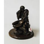 A modern bronzed figure group entitled The Lovers, a male and female in embracing pose, on wooden