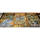 Three boxes of assorted kit built model military aircraft and war ships
