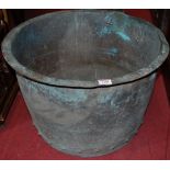 An early 20th century circular copper log bucket, of typical riveted form, dia. 52.5cm