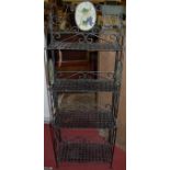 A contemporary black painted metal four-tier folding boulangerie rack, w.60cm