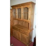 A contemporary rubber wood kitchen dresser, w.130cm