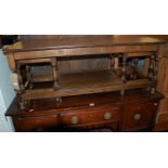 An oak nest of three occasional tables