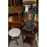 Occasional furniture to include; a black painted iron saucepan stand, marble topped and cast iron