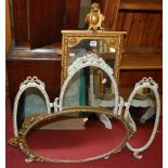 A collection of five various mirrors; and a large Eastern embossed copper circular tray (with