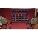 A pair of 19th century iron and brass andirons; together with a later fire basket