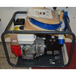 A Belle Minigen 2000 portable generator, having a Honda engine