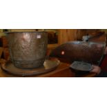 Two Eastern engraved copper chargers, together with a small copper riveted circular log bucket,