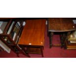 An oak gateleg table, on barleytwist supports; an oak tea trolley; and a walnut towel rail (3)