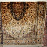 A Persian woollen cream ground carpet, the heavy floral central ground further decorated with