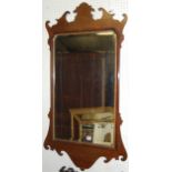 A late 19th century mahogany fret carved wall mirror, in the Chippendale style, h.121cm, w.66cm