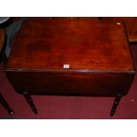 A Victorian mahogany round cornered pembroke table, having single end drawer and on ring turned