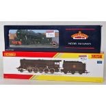 A Hornby R3273 Railroad series BR black class 9F engine and tender No. 94027 fitted with Crosti