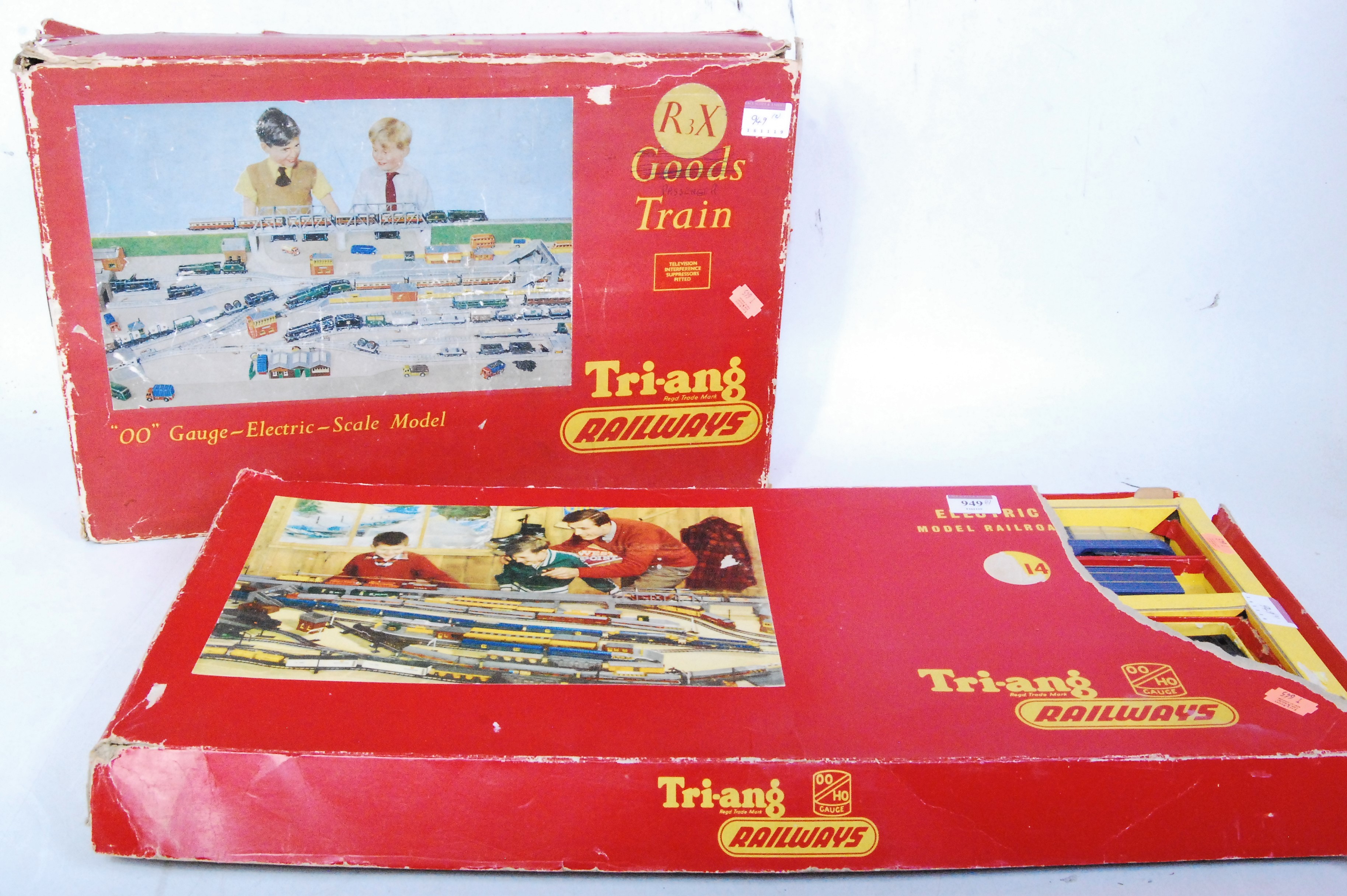 Two Triang train sets R2x appears complete but in poor box (G-BP) and an RS14 set containing 4 first