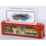 A Triang Stephensons Rocket train pack containing locomotive, tender, Times coach and train crew (