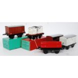 Five No. 50 Hornby wagons - flat with meat container (NM-BVG) box red with green label; goods van,