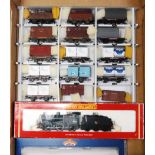 Large tray containing Hornby BR black ex LMS 4F goods loco and tender R2066, with 11 wagons mainly
