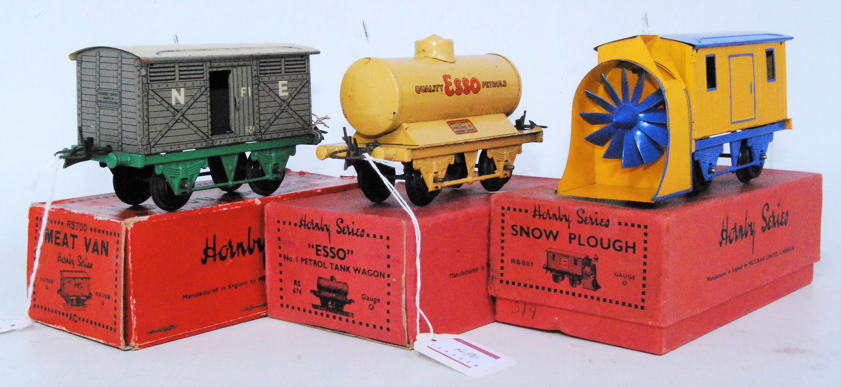 Three pre-war Hornby wgaons: 1934-6 snowplough, plain, blue standard base, yellow body, blue lined