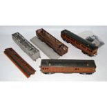 Two Hornby Metropolitan coaches and some parts of coaches: one coach E plug & socket connections,