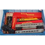 Tray containing Triang R155 yellow diesel switcher striped ends (NM-BNM), 4-6-2 steam engine and