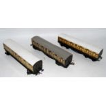 Three Leeds Model Co. bogie coaches, LNWR. Two original (G) and one with original sides, replacement