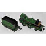 Carette 0 gauge 4-4-0 clockwork loco and tender, green, loco No. 375 'GC & Co' embossed on