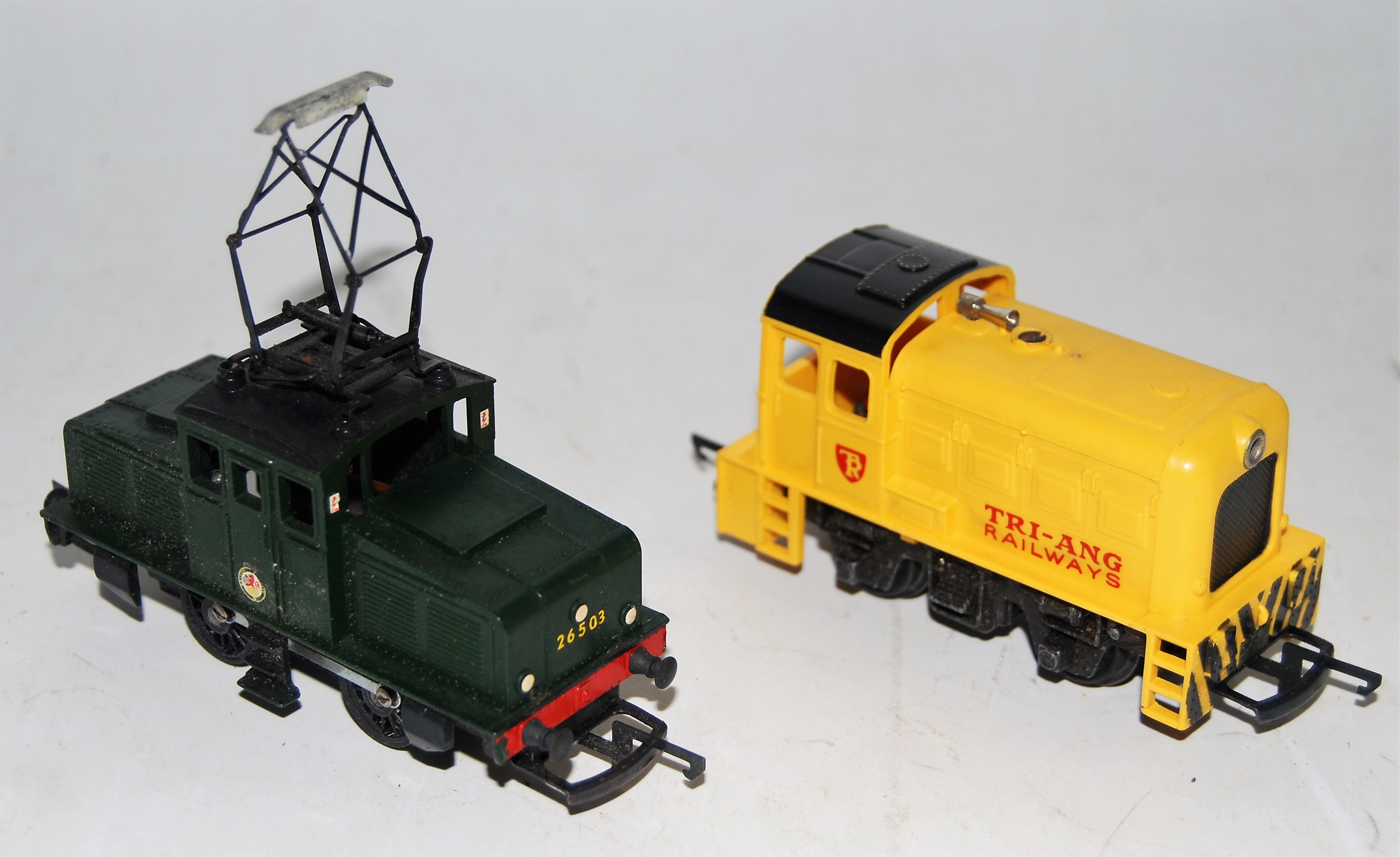 A Triang TC series 0-4-0 diesel switcher yellow with TR shield Triang (G) and a green 0-4-0