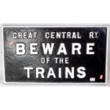 An original cast iron Great Central Railway 'Beware of the Trains' sign, repainted example, white on