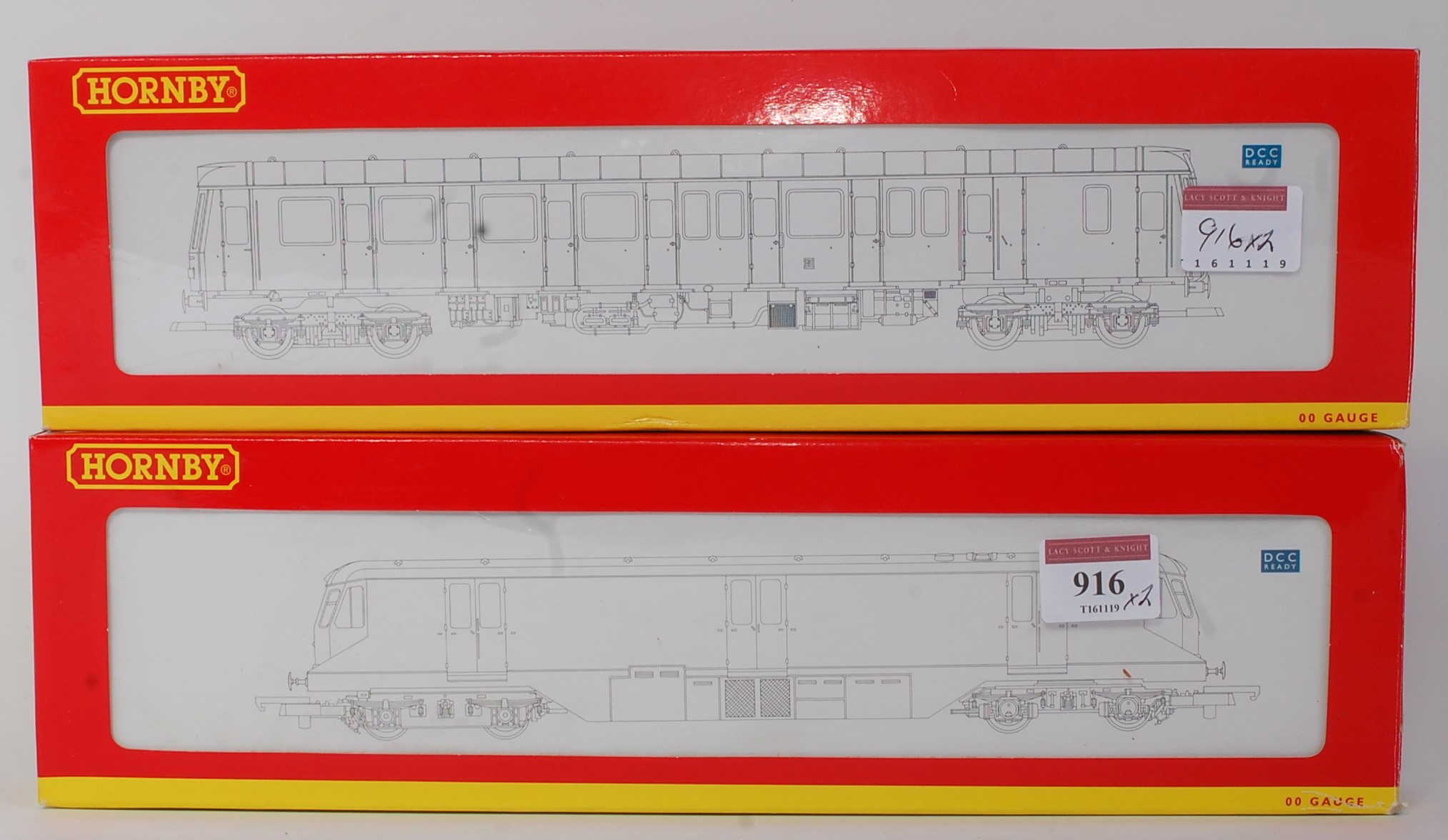 A Hornby R2768 GWR diesel parcels railcar No. 34 (M-BNM) together with R2771 BR green yellow end