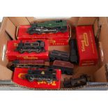 A selection of Triang locomotives, 2 early black, one later lined black Jinty tank engines,
