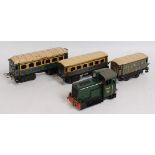 Small tray containing four items: Lima 4-wheeled diesel engine totally repainted green as BR