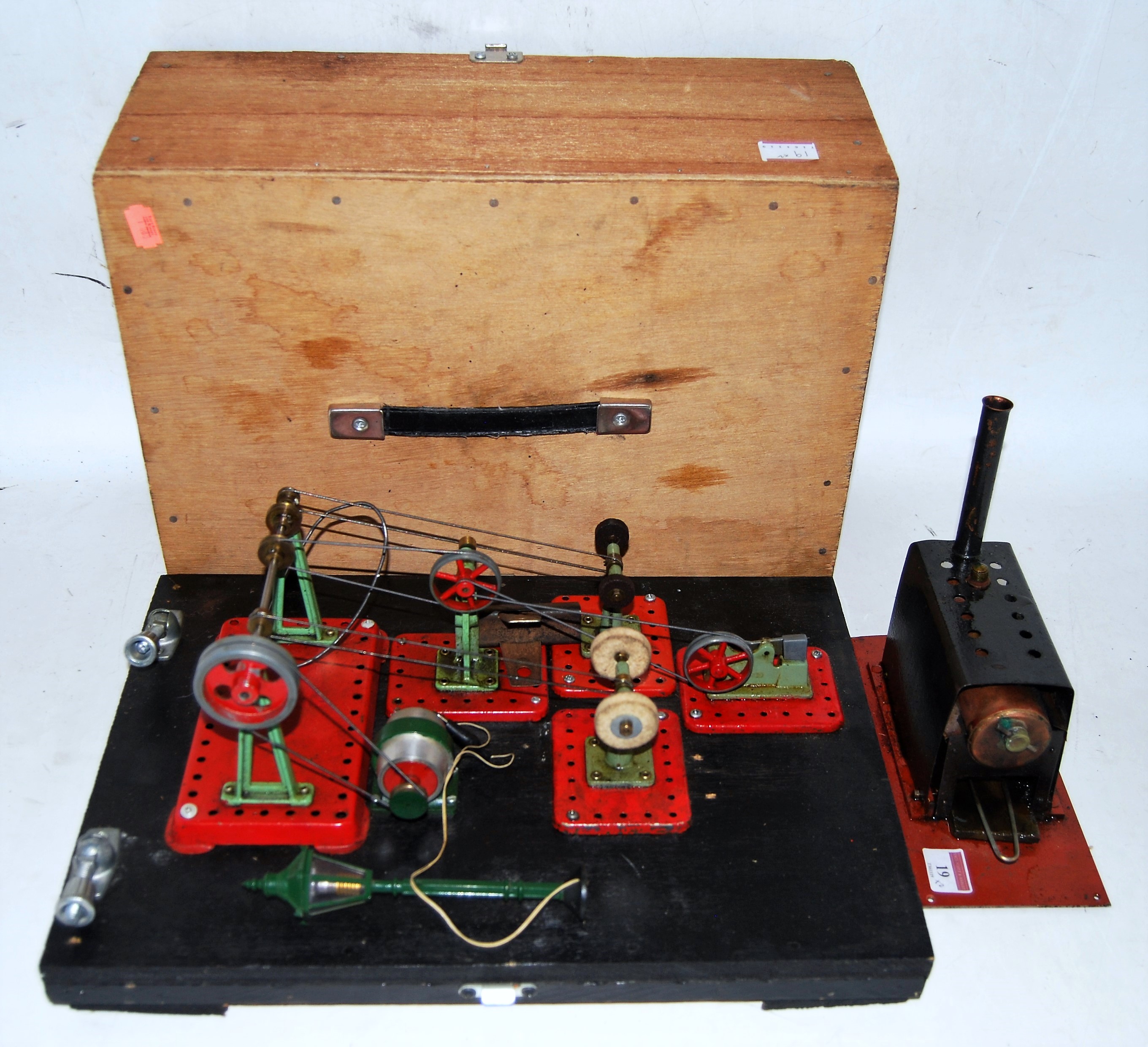 A scratch built miniature live steam boiler comprising of tin housed copper boiler with safety valve