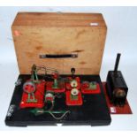 A scratch built miniature live steam boiler comprising of tin housed copper boiler with safety valve