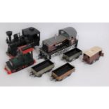 A collection of various G-gauge and 0-gauge loose locomotives and rolling stock to include a home