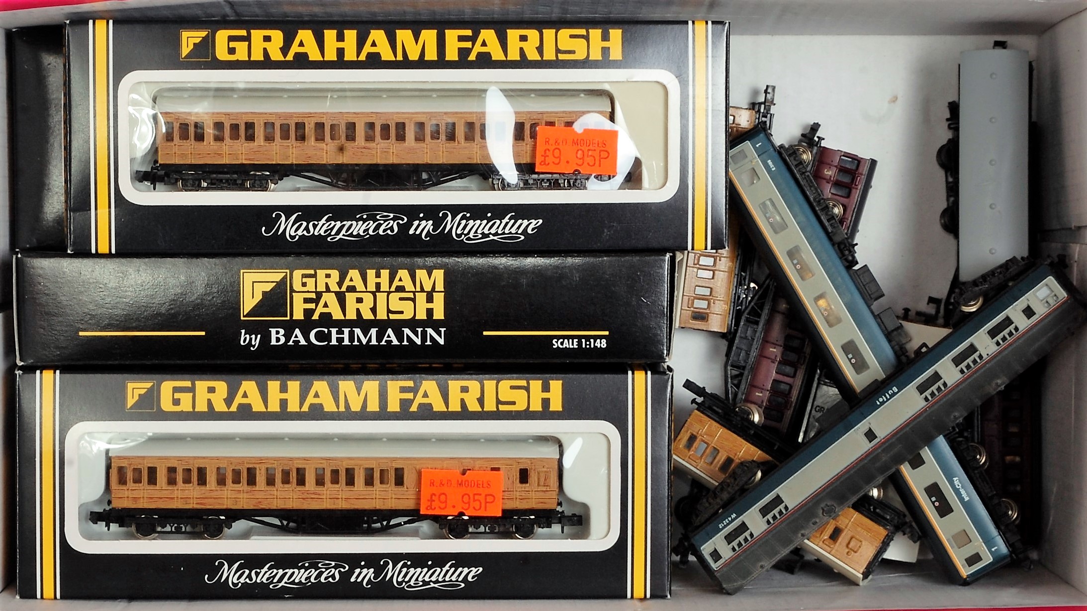Mainly Graham Farish N gauge coaches: 3x LNER suburban bogie; 4x LNER 4-wheel suburban; 3x BR blue/