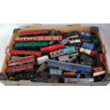 2 trays containing 80+ wagons and a few coaches by mixed makers some weathered and with loads added,