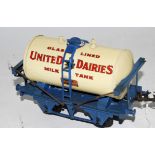 Hornby 1934-7 United Dairies Milk tank wagon with lighter blue standard base, white tank, no drain