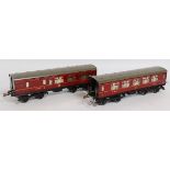 Two 1937-41 Hornby No.2 Corridor coaches, maroon LMS: br/comp & 1 st /3 rd . Each has marks to