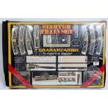 A Graham Farish N gauge starter train set appears complete, box outer damaged (G-BD)