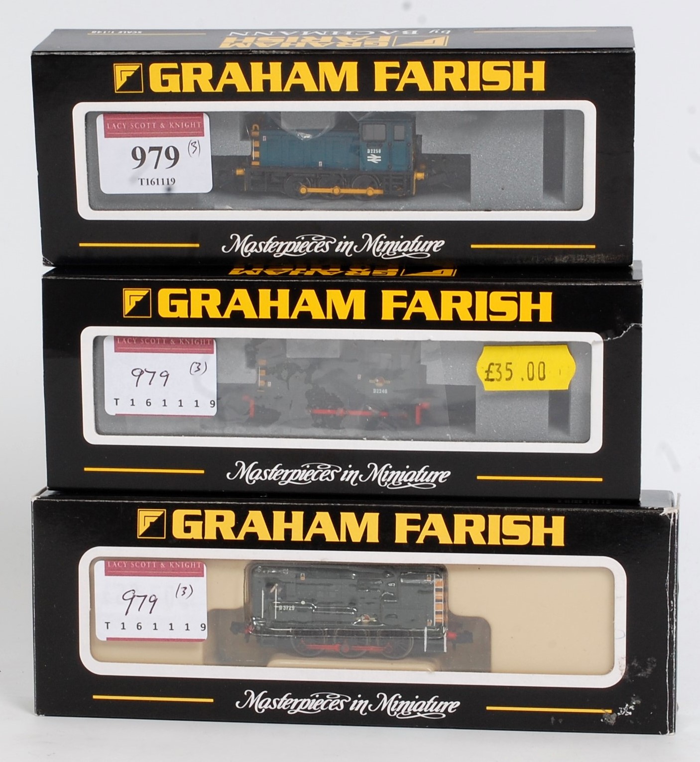 Three 'N' gauge Graham Farish (Bachmann) 0-6-0 diesel shunters; 371-050 class 04 75D2246 BR green