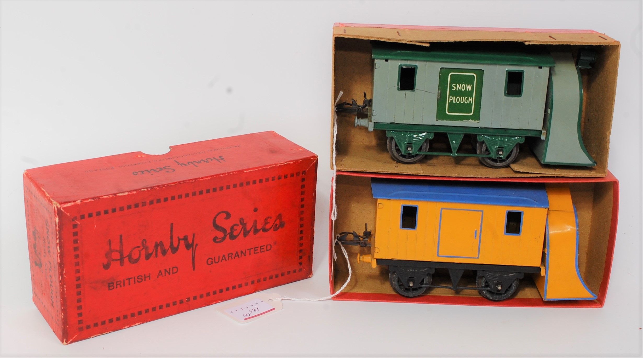 Two Hornby snow ploughs: 1930-2 plain, green standard base, grey body, green lined plough 'Snow