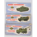 A Dinky Toys boxed military diecast group, three examples to include No. 661 recovery tractor, No.