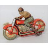 A Technofix (US zone of Germany) No. GE258 tinplate motorcycle and rider comprising of orange and