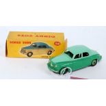 A Dinky Toys No. 156 Rover 75 saloon comprising of two-tone green body with mid green hubs in the