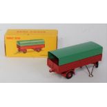 A French Dinky Toys No. 70 Remorque Bachee covered draw bar trailer, comprising of dark base and