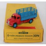A Dinky Toys No. 30N trade box of 6x farm produce wagons, containing one original model finished