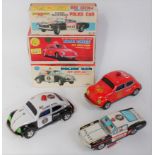 Three various boxed tin plate and friction drive emergency services vehicles to include an SH of