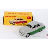 A Dinky Toys No. 164 Vauxhall Cresta saloon comprising of grey and dark green body with grey hubs,