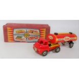 A Wells Brimtoy (UK) large articulated model of an Esso petrol tanker comprising of tinplate and