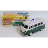 A Yonezawa No. 703 Japanese tinplate and battery operated model of a Polizei Volkswagen van,